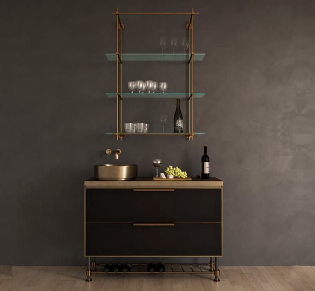 Modern dark wood sideboard with copper-framed glass shelves above, holding glassware and a wine bottle against a charcoal wall.