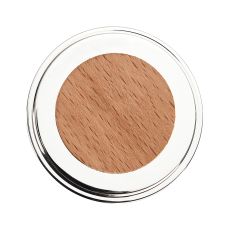 Round makeup compact with light brown pressed powder in a shiny silver case