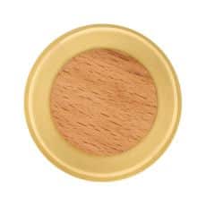 Round compact of pressed beige powder in a yellow case viewed from above