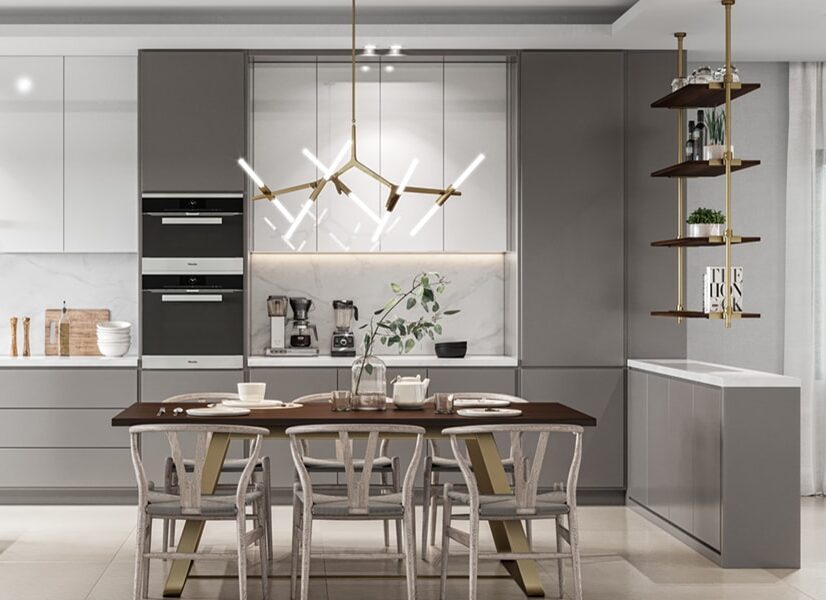 Contemporary kitchen with marble counters and island, a six-seat dining table under a brass starburst chandelier.