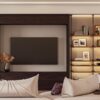 Cozy living room with a dark wood media wall, wall-mounted TV, and lit open bookshelves on both sides.