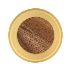 Top down view of a round wooden disk surrounded by a yellow circular rim